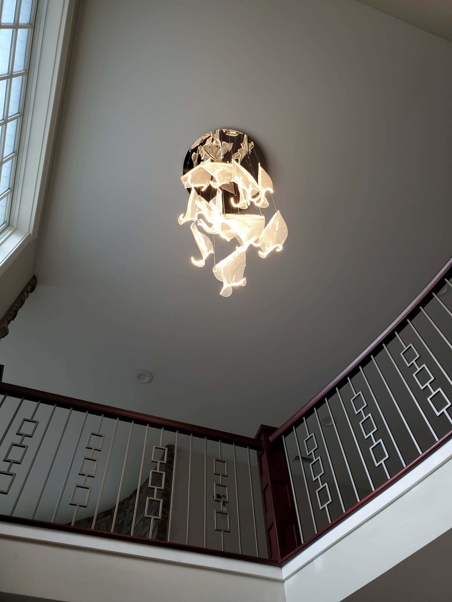 Modern chandelier installation